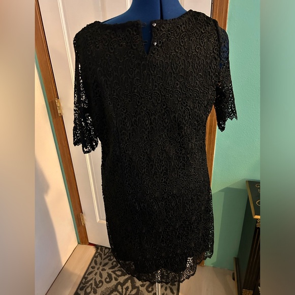 Black lace dress no tags or size but it fits me size 8. - Picture 3 of 4